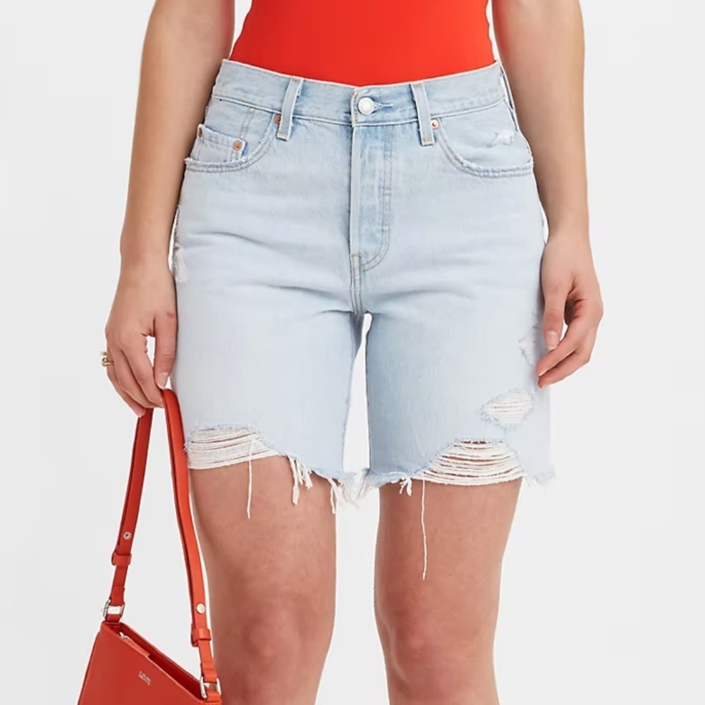 Levi's Light Blue Distressed High-Rise Jean Shorts. 27